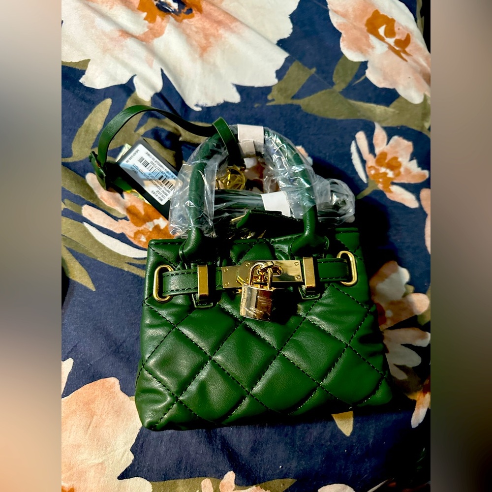 This Badgley Mischka handbag is a stylish accessory for any woman.